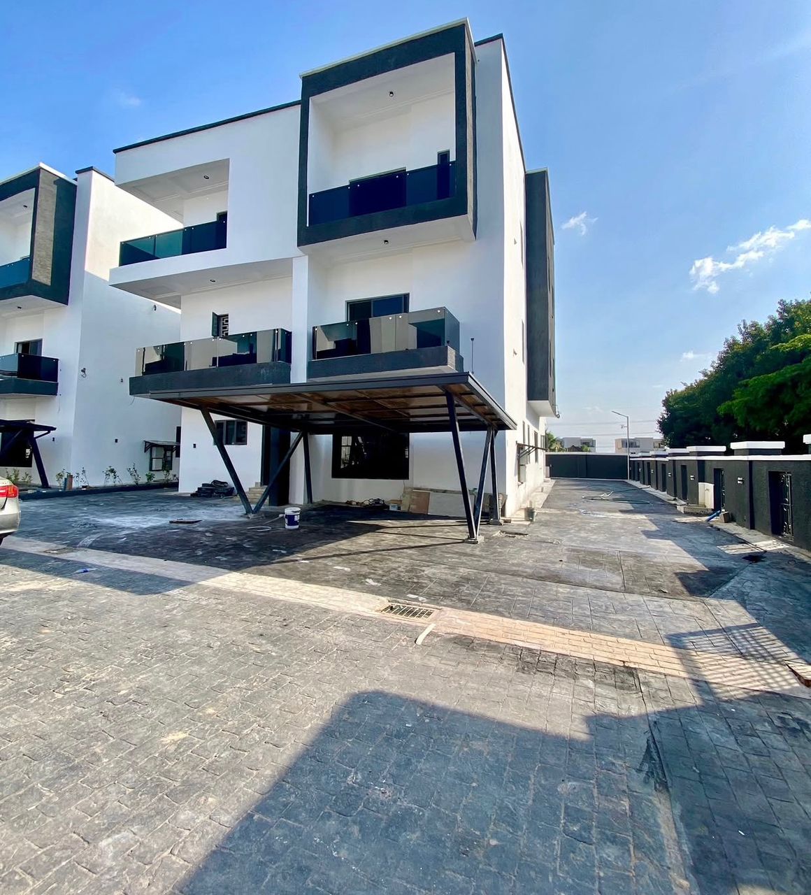 6 Bedroom detached home in Katampe Extension, Abuja — modern white exterior with glass balconies